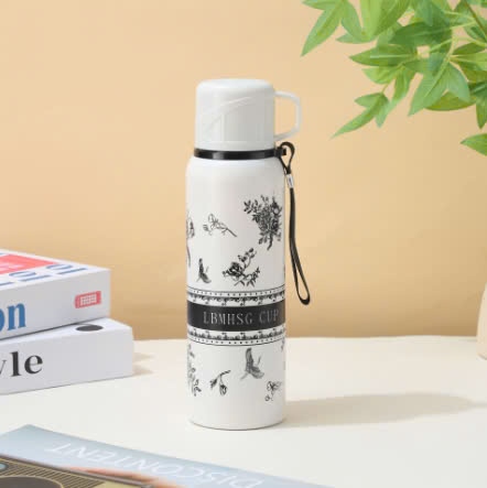 BÌNH GIỮ NHIỆT KÈM CỐC HÌNH HOA 600ml (2)